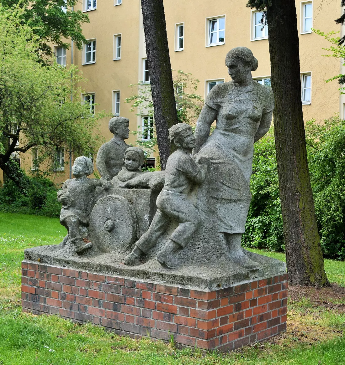 Frau mit Karren